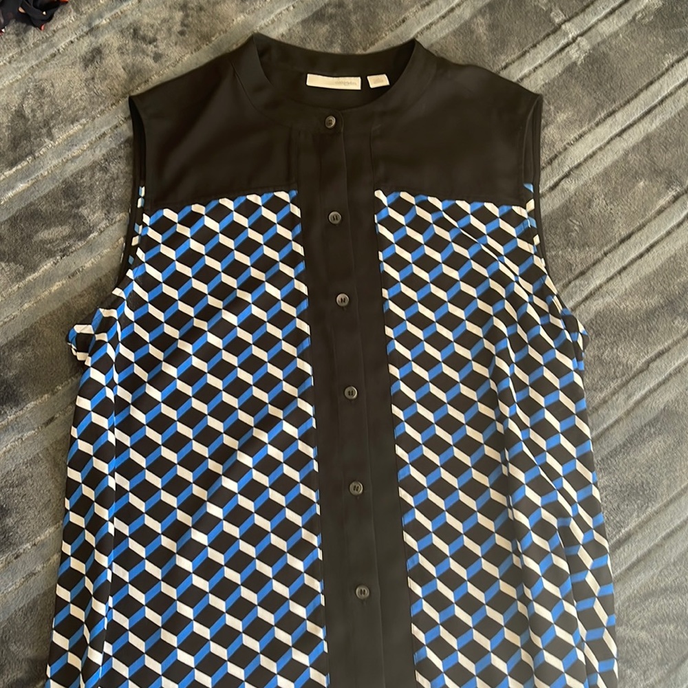 Sleeveless button down blouse